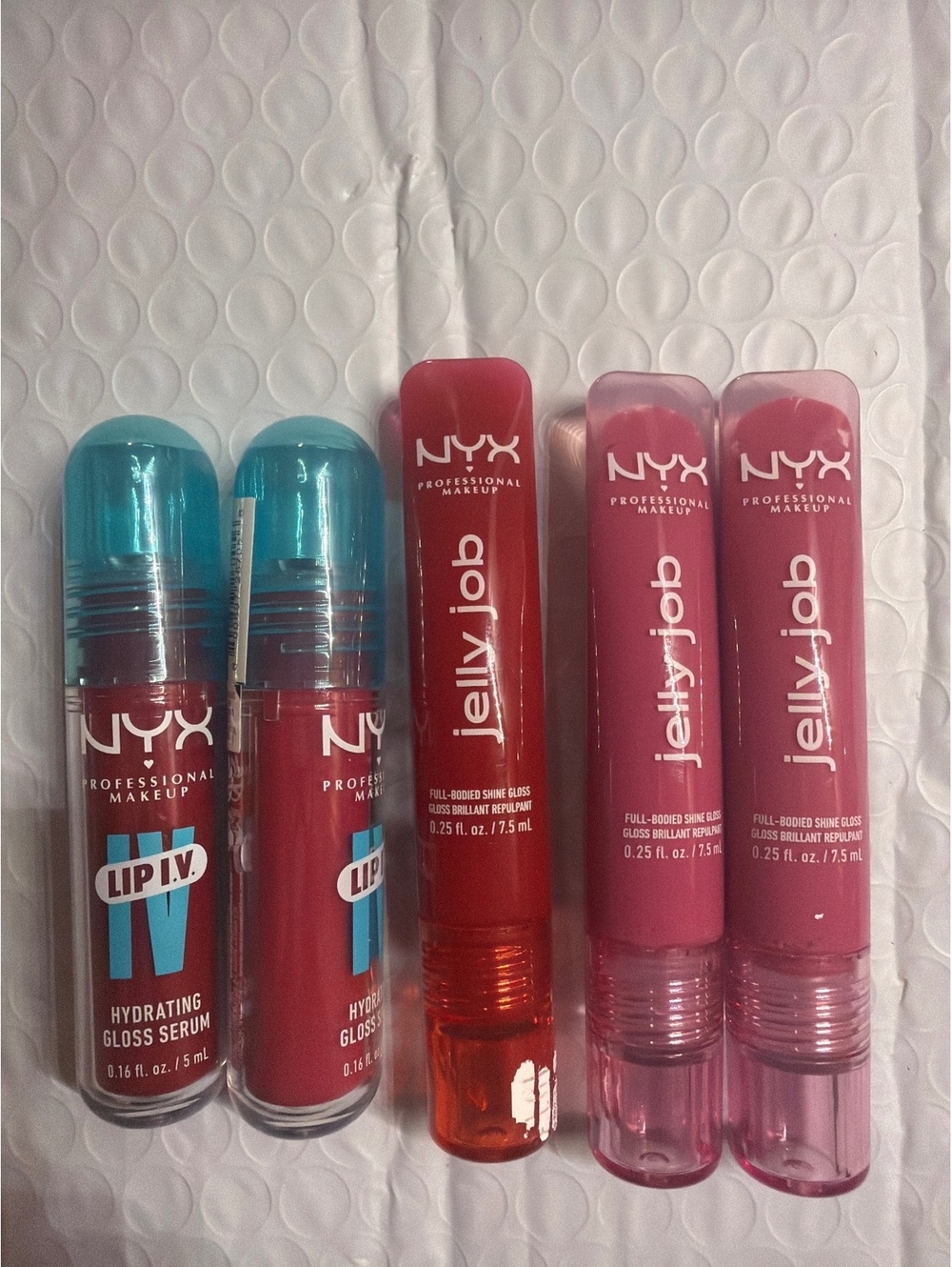(5 pack) NYX ASSORTED LIP GLOSSES AS SEEN IN PICS $55 value
